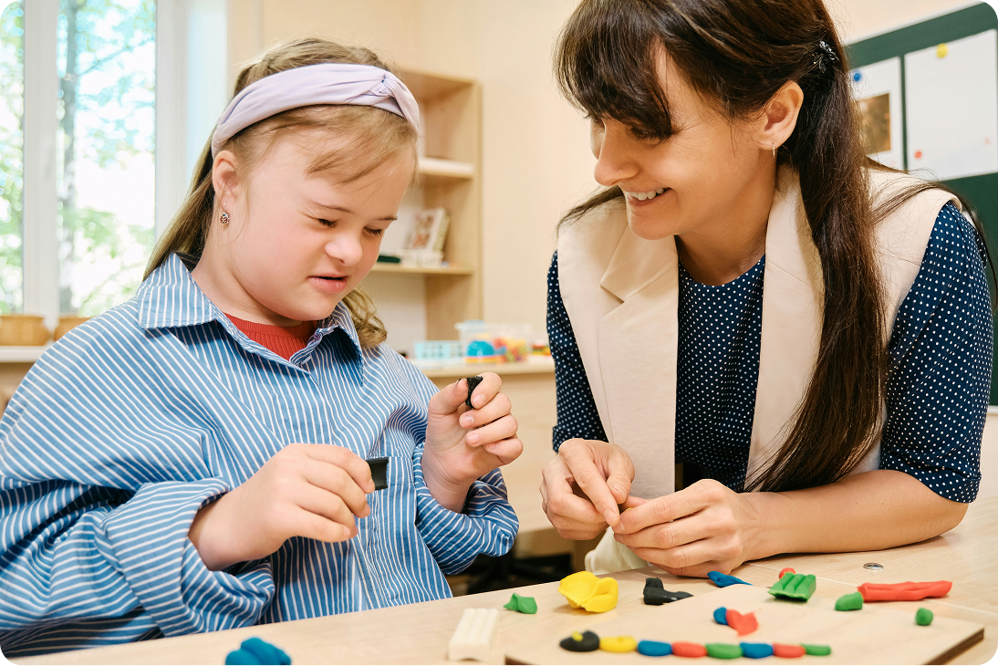 Child and therapist playing